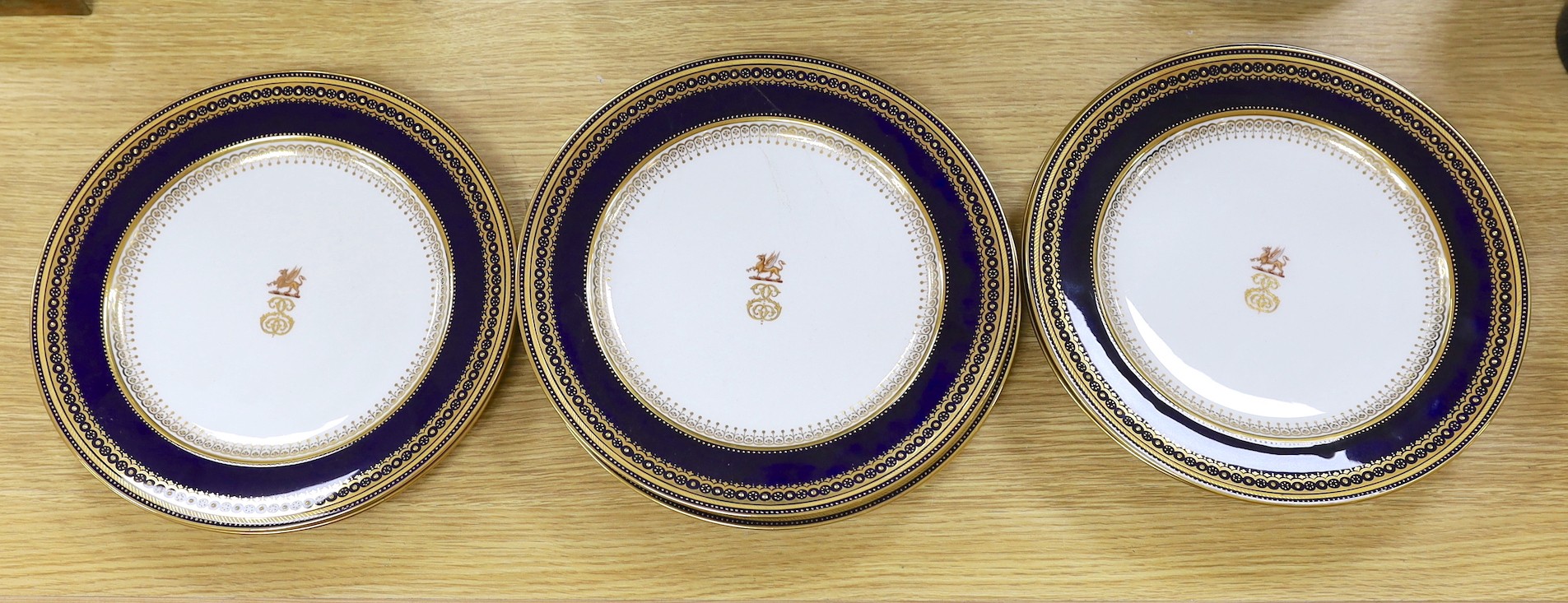 Eight Minton armorial plates, 26 cms diameter, late 19th century